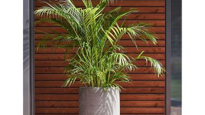 Tall outdoor planters with artificial plants for every space
