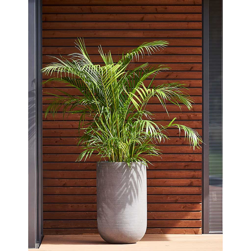 Tall outdoor planters with artificial plants for every space