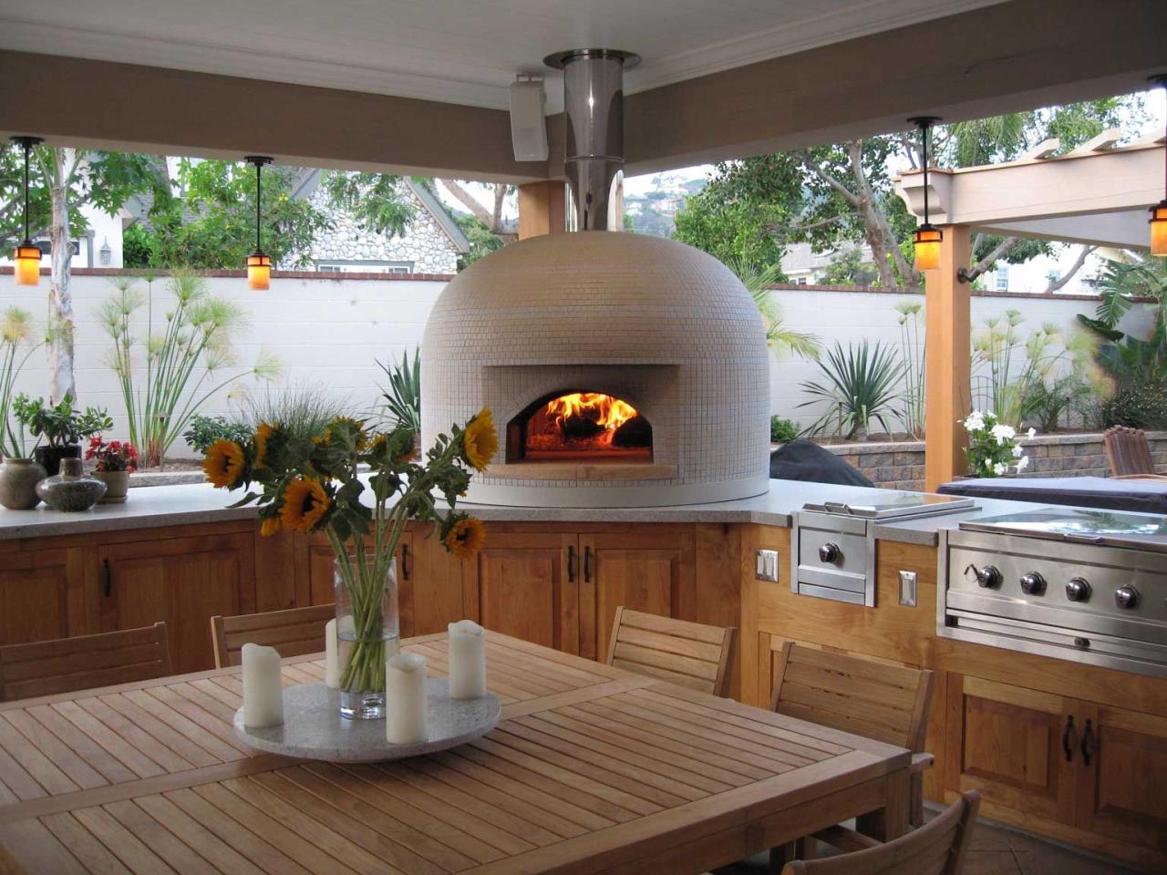 Outdoor kitchen with oven for ultimate outdoor cooking